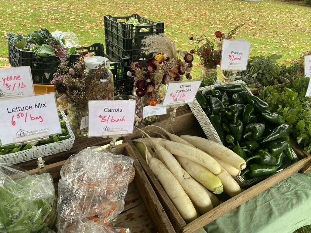 farmers market display of fresh veggies